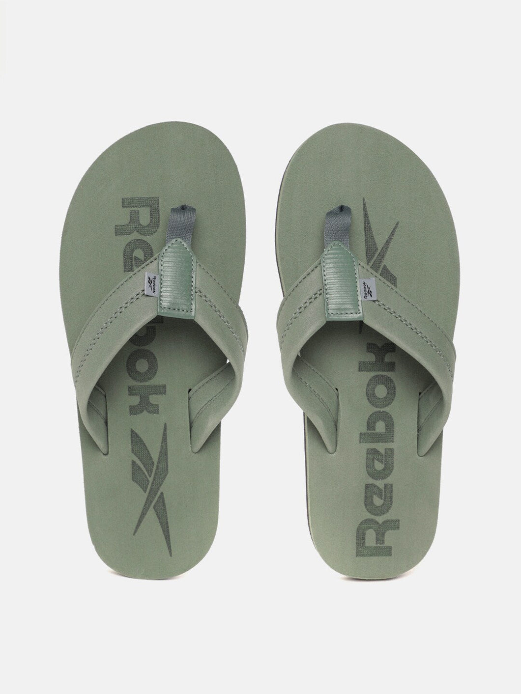 1df83c42-7314-4dbe-a5b4-1a38c561409e1628564608906-Reebok-Men-Flip-Flops-2171628564608506-1.jpg