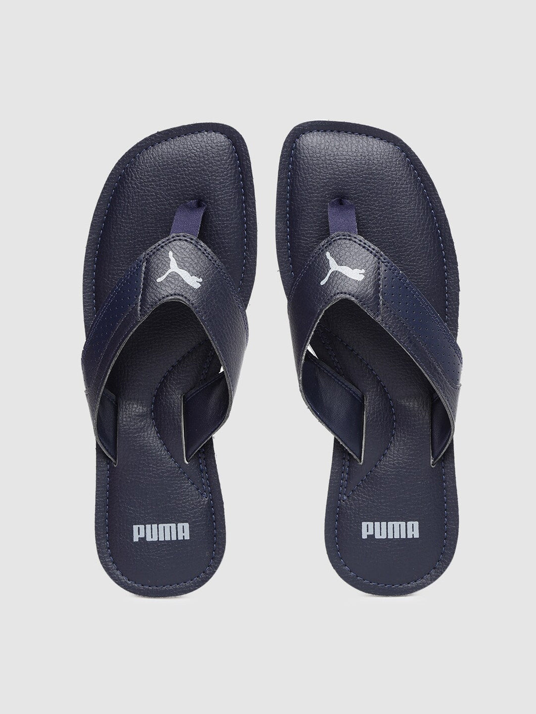 3749a7fd-fc6b-4338-912c-f56065ecd0341572515867537-Puma-Men-Navy-Blue-Solid-Tyrant-IDP-Thong-Flip-Flops-6815725-1.jpg