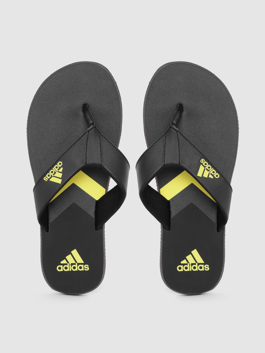 5cc9fe2c-e2e2-4ccf-8972-d4beb068c2cd1623049471885-ADIDAS-Men-Black-Yellow-Colourblocked-Thong-Flip-Flops-4791-1.jpg