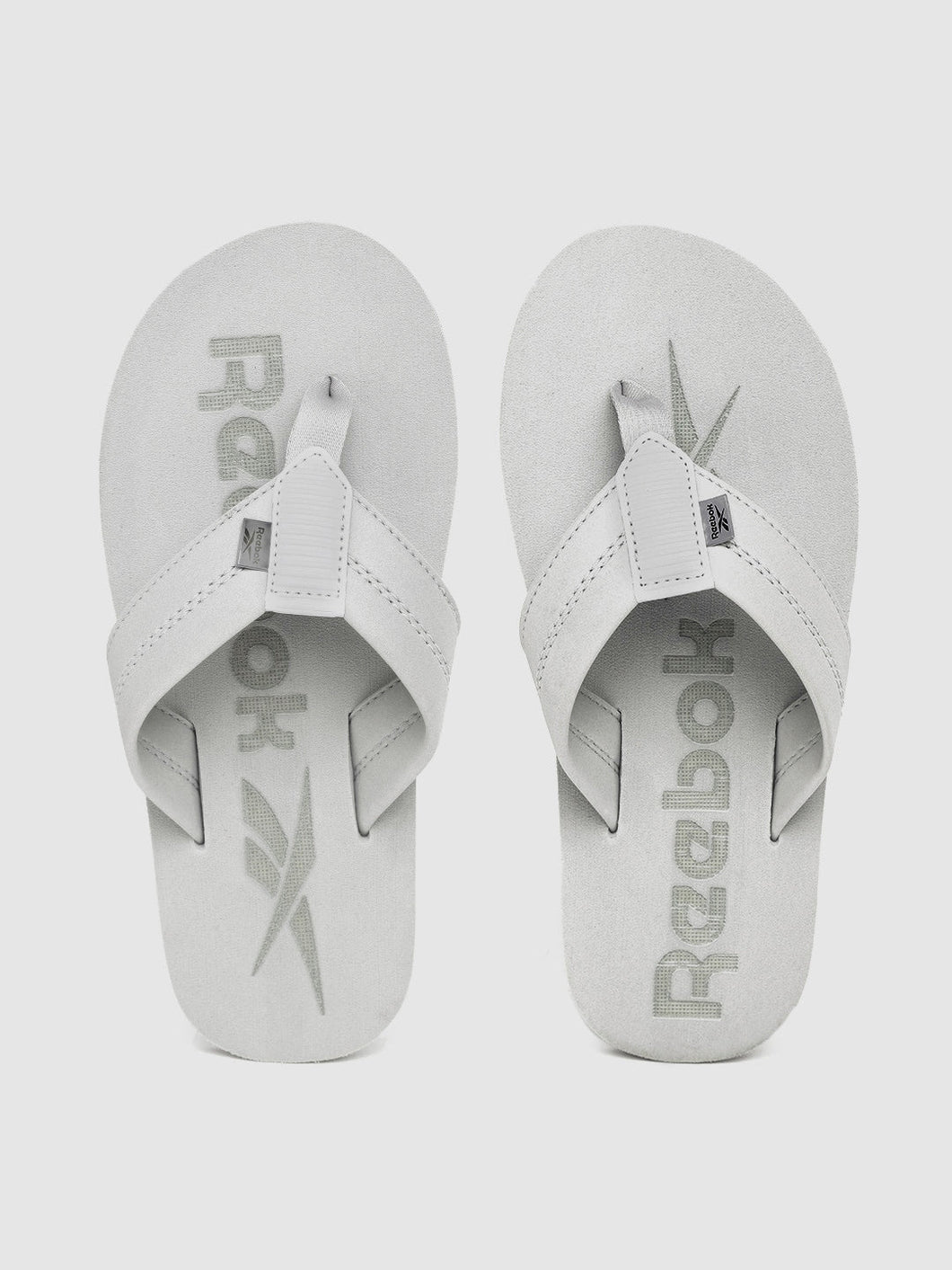 6b366f4a-8cc5-4bac-9381-9564d3a5bd421623231922401-Reebok-Men-Flip-Flops-4281623231922155-1.jpg