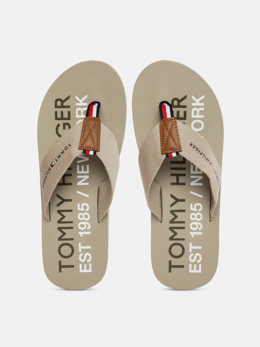 791b3080-57a5-4dbc-bab2-cec242a561d51628665346756-Tommy-Hilfiger-Men-Beige-Printed-Thong-Flip-Flops-9401628665-1.jpg