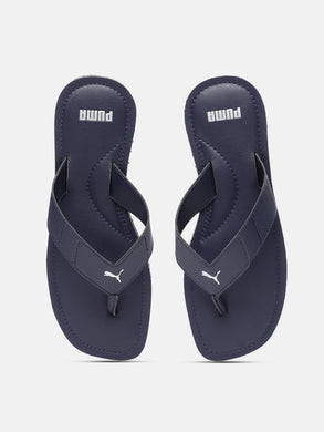 989c02c4-14a7-4042-bc6f-2f6642bf95421637329118397-Puma-Men-Navy-Blue-Caper-V3-IDP-Solid-Synthetic-Thong-Flip-F-1.jpg