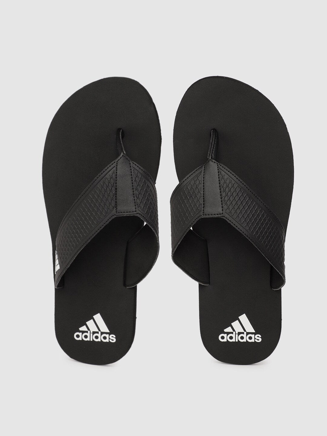 cd330087-c1fd-4837-ade0-7482913a6ae01629543930244-ADIDAS-Men-Flip-Flops-1581629543929963-1.jpg