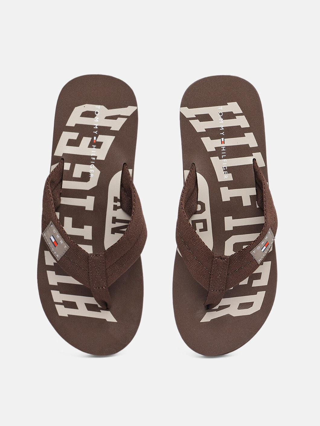 f4e399d2-16d0-4166-afa8-e4ea63af6c0b1628662114547-Tommy-Hilfiger-Men-Brown-Printed-BEACH-Thong-Flip-Flops-4671-1.jpg